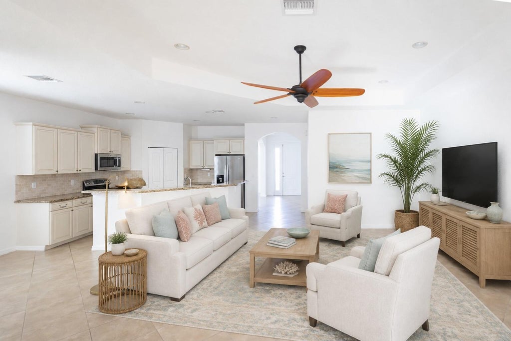 Photo of 4376 NW Oakbrook Circle, Jensen Beach, FL 34957 (MLS # B26034822)