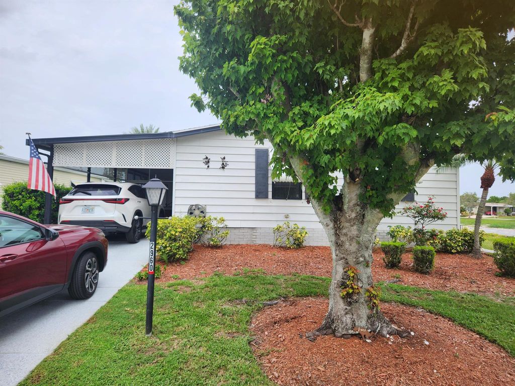 Photo of 2960 Fiddlewood Circle, Port Saint Lucie, FL 34952 (MLS # R11003620)