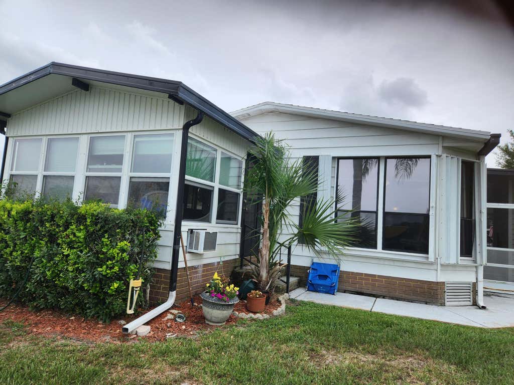 Photo of 2960 Fiddlewood Circle, Port Saint Lucie, FL 34952 (MLS # R11003620)
