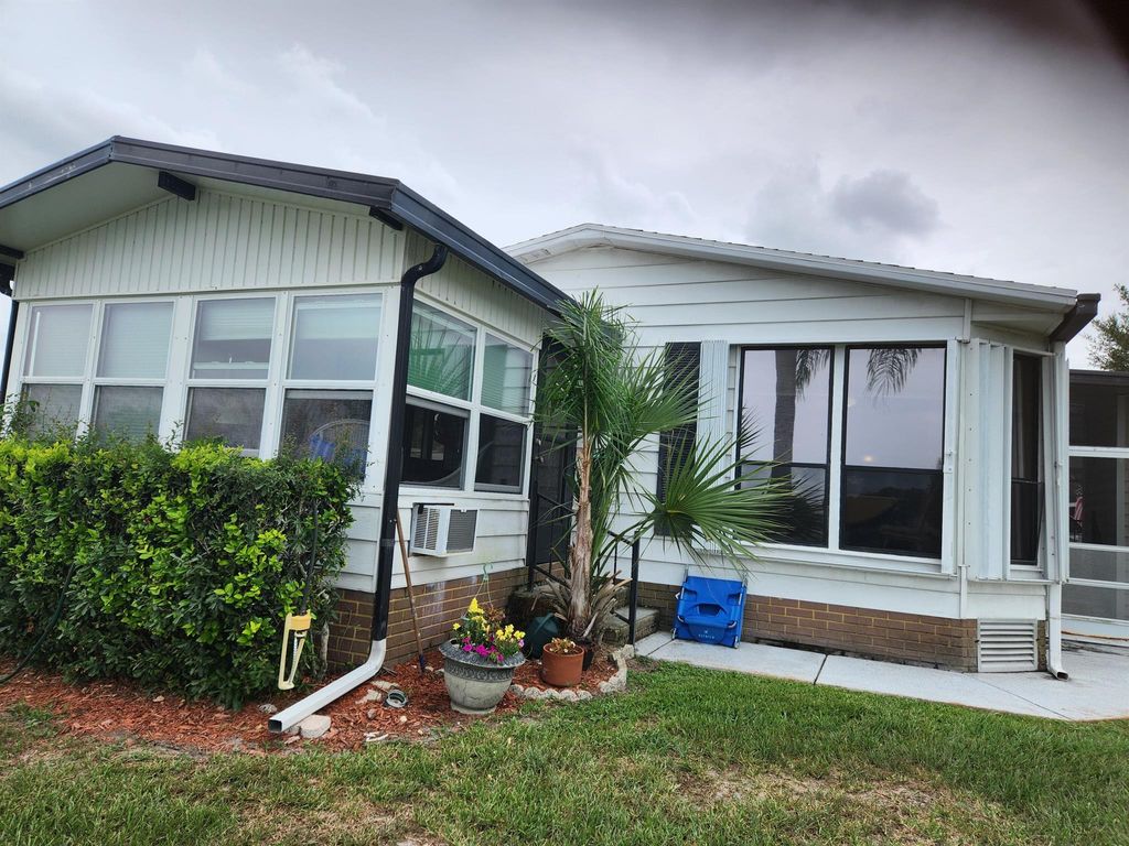 Photo of 2960 Fiddlewood Circle, Port Saint Lucie, FL 34952 (MLS # R11003620)