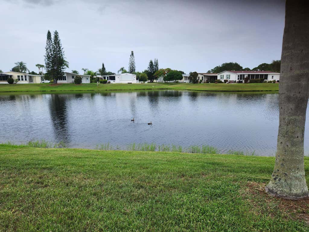 Photo of 2960 Fiddlewood Circle, Port Saint Lucie, FL 34952 (MLS # R11003620)