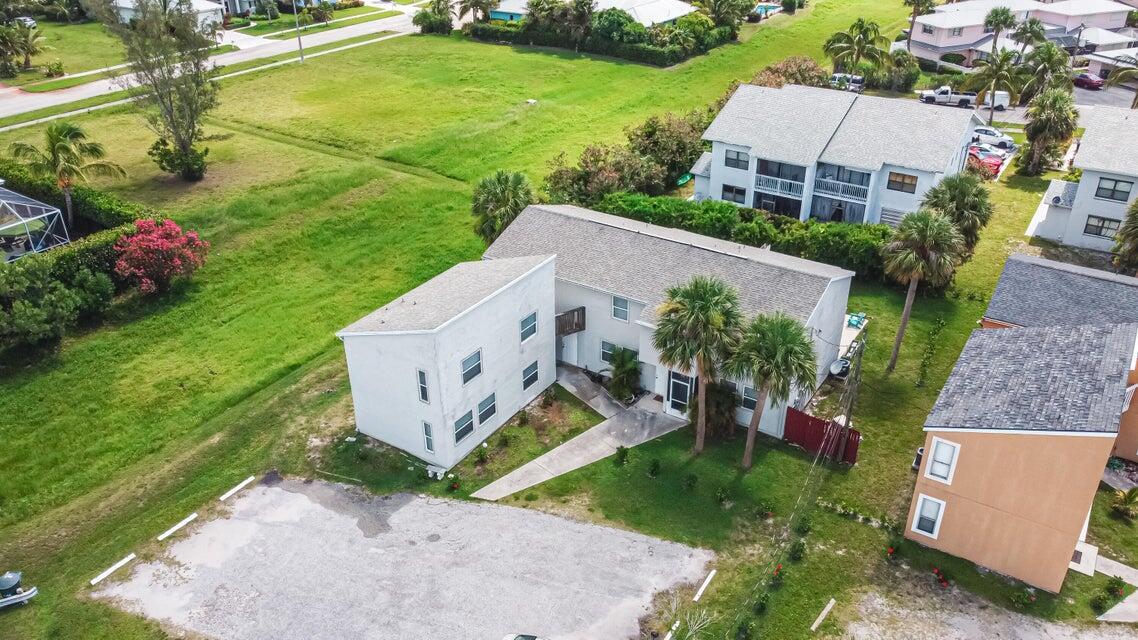 Welcome to this spacious 2-bedroom, 1.5-bathroom unfurnished townhouse, perfectly situated near the beach and downtown Fort Pierce. This annual rental offers an open-concept living space, a fully equipped kitchen, and a private patio. Upstairs, you'll find two roomy bedrooms. Enjoy the convenience of being in close proximity to the beach and the vibrant nightlife and entertainment of downtown Fort Pierce. This is a great opportunity for long-term living in a desirable location. Don't miss out, schedule a showing today!