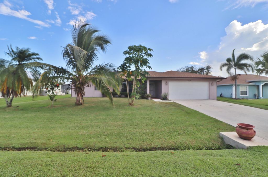 Photo of 2234 SE Marsh Avenue, Port Saint Lucie, FL 34952 (MLS # R10920152)