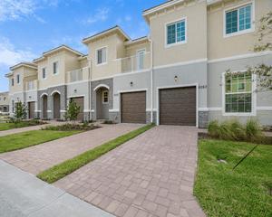 BRAND NEW - NEVER LIVED INBeautiful, corner-unit, townhome in a brand new development, featuring a White kitchen with granite countertops, impact windows, and brand new everything. One bedroom downstairs, Master plus two additional bedrooms upstairs - Huge closets. THREE FULL BATHROOMS! Backs up to the preserve area so privacy is included.