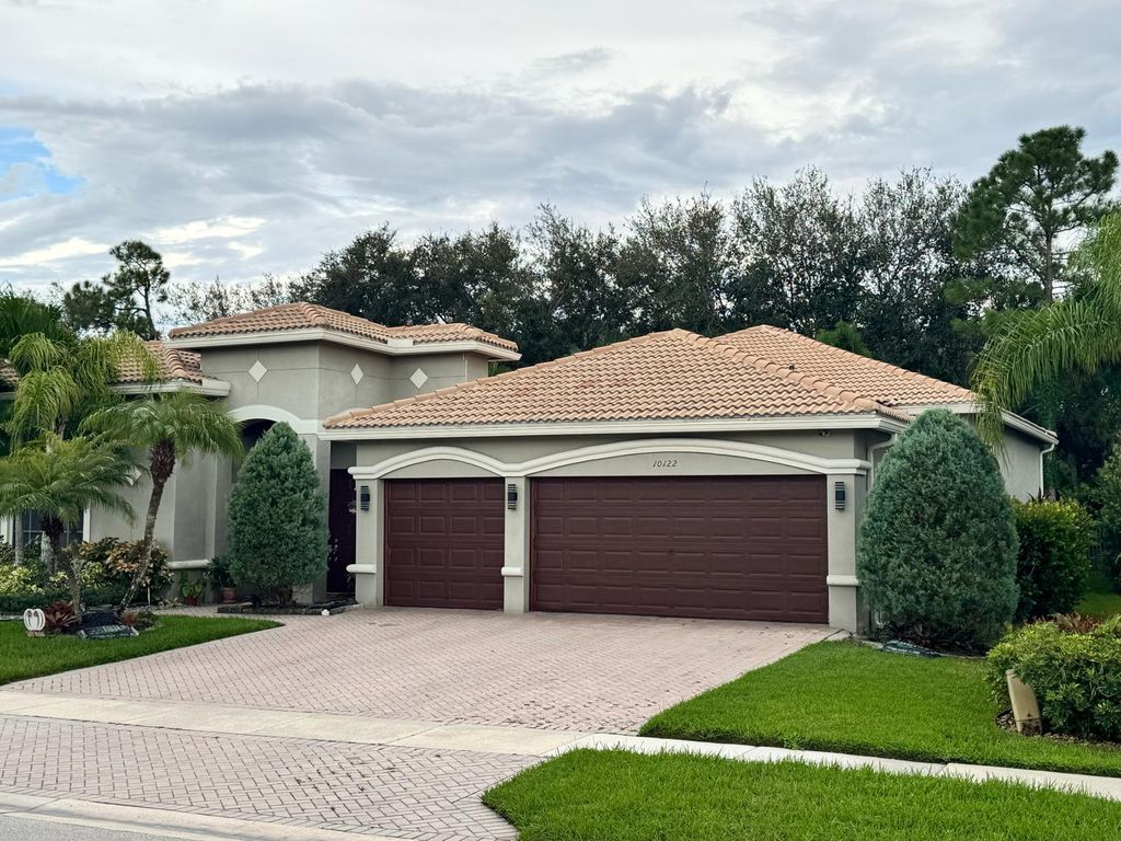 Photo of 10122 Oak Meadow Lane, Lake Worth, FL 33449 (MLS # B26024630)