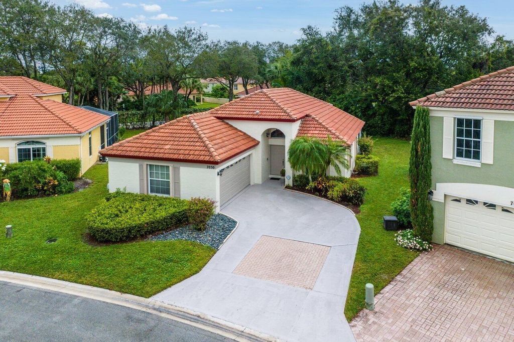 Photo of 7030 Galleon Cove Circle, Riviera Beach, FL 33418 (MLS # R10936631)