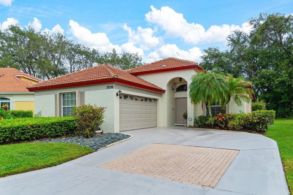 Photo of 7030 Galleon Cove Circle, Riviera Beach, FL 33418 (MLS # R10936631)