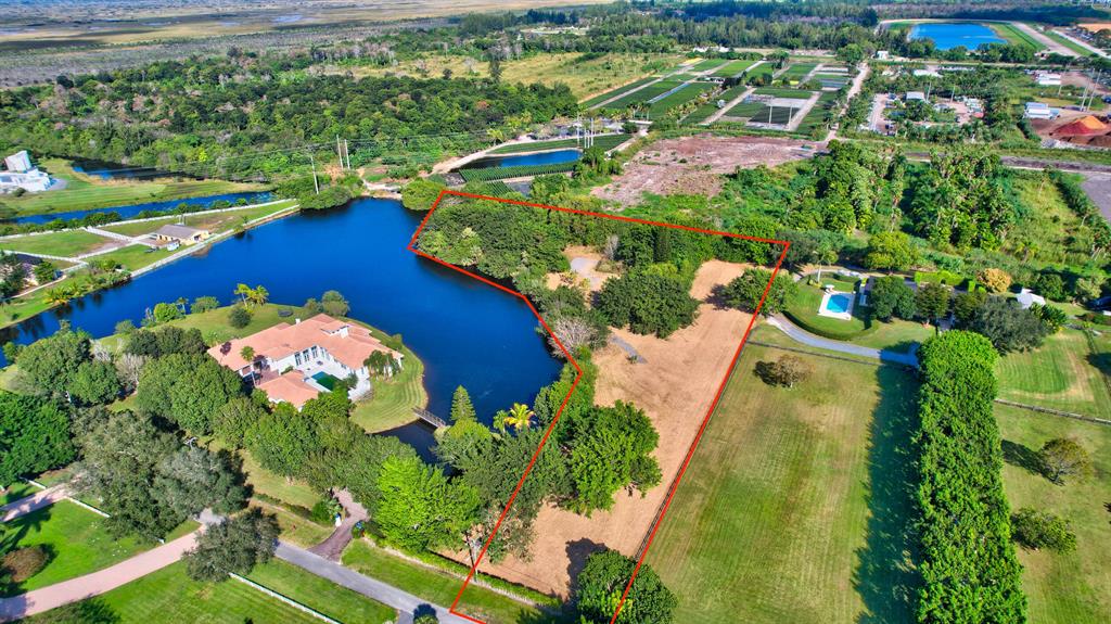 Rare opportunity in this West Delray Equestrian community in an A rated school district. This picturesque location is a 5.5 acre buildable lot in the exclusive gated community of Tierra Del Rey. Build the home of your dreams!