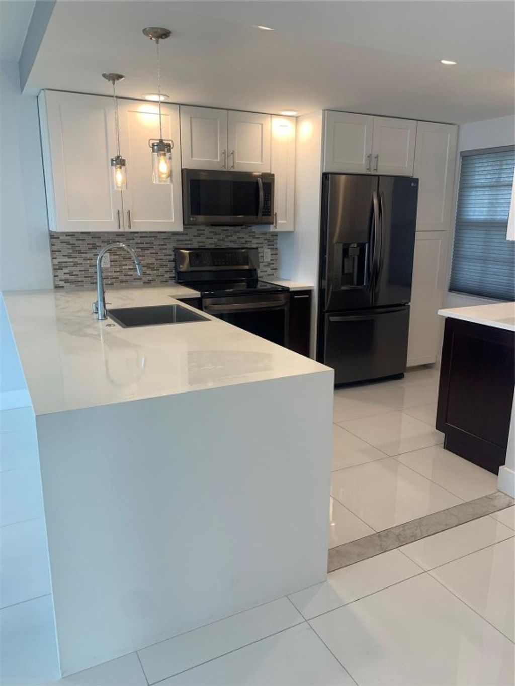 Photo of 3499 Oaks Way #410, Pompano Beach, FL 33069 (MLS # F10408307)