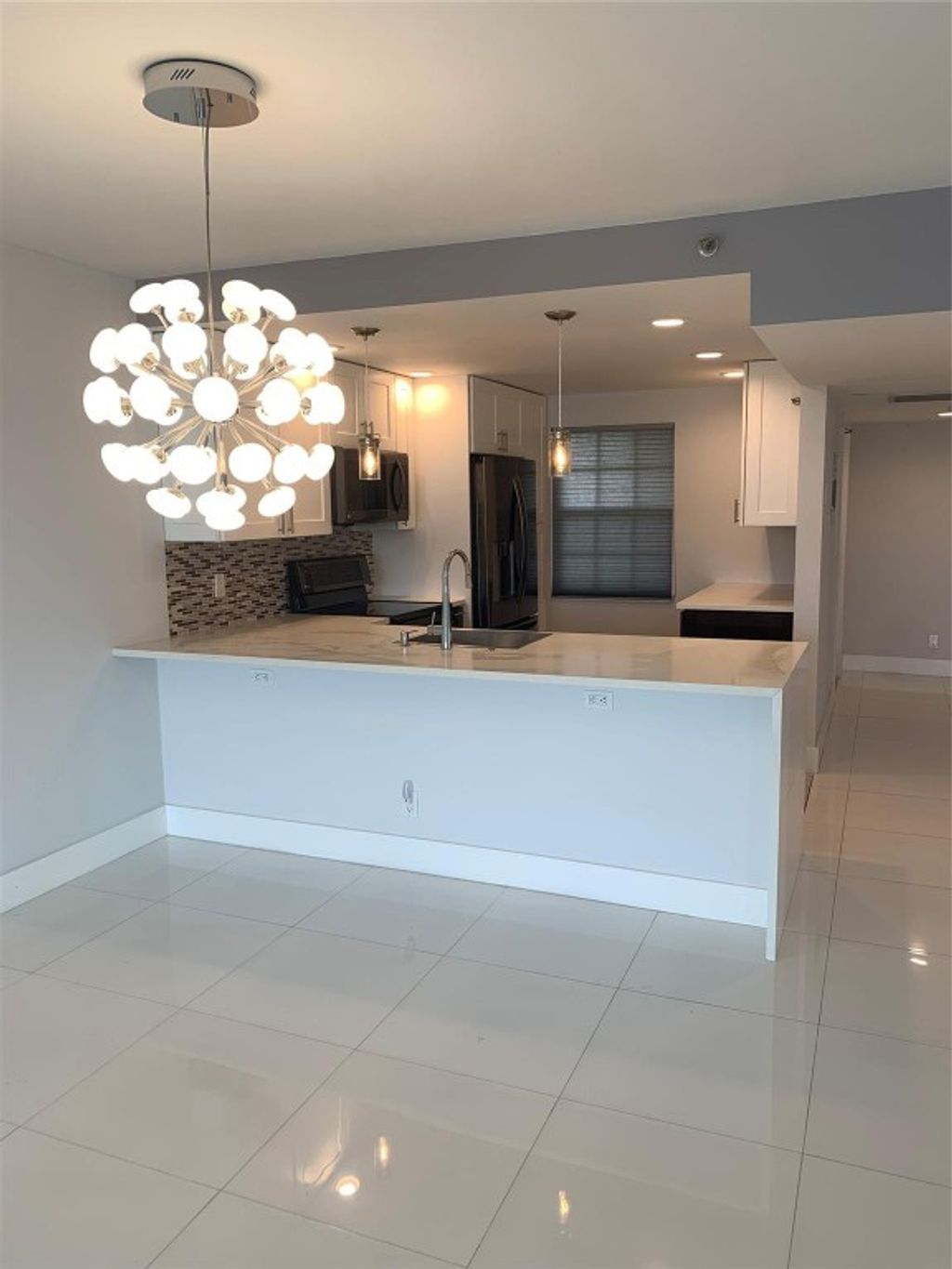 Photo of 3499 Oaks Way #410, Pompano Beach, FL 33069 (MLS # F10408307)