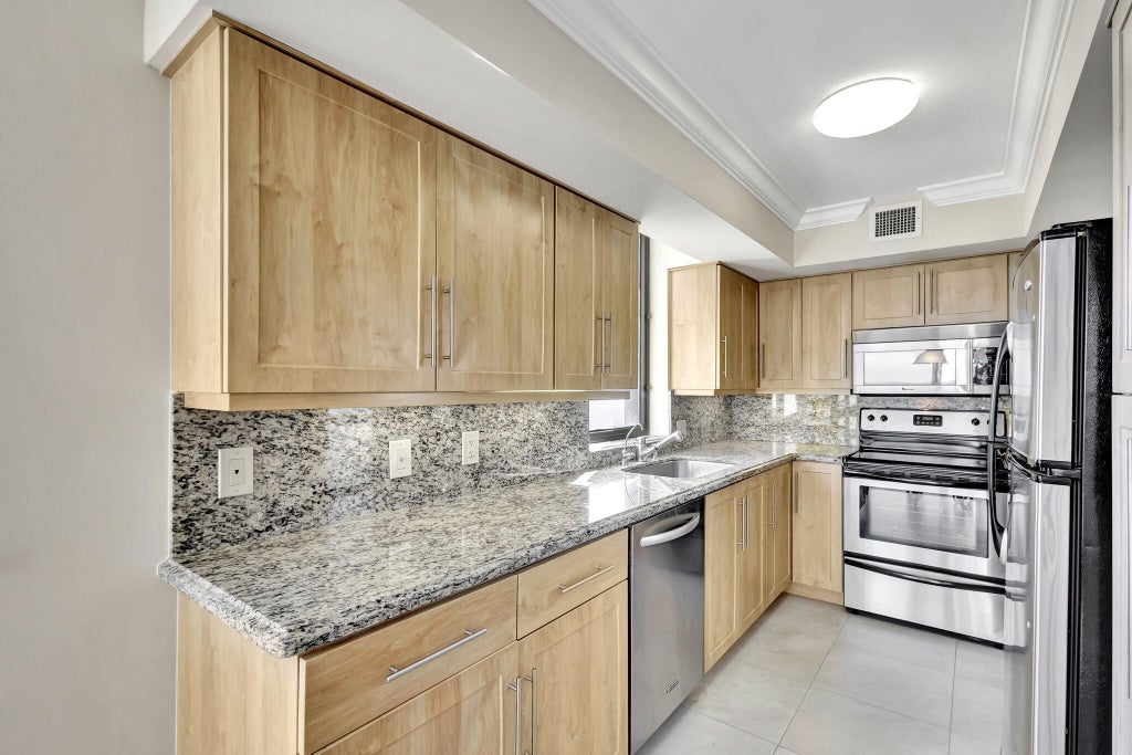 Photo of 5380 N Ocean Drive #14-A, Singer Island, FL 33404 (MLS # R10973972)