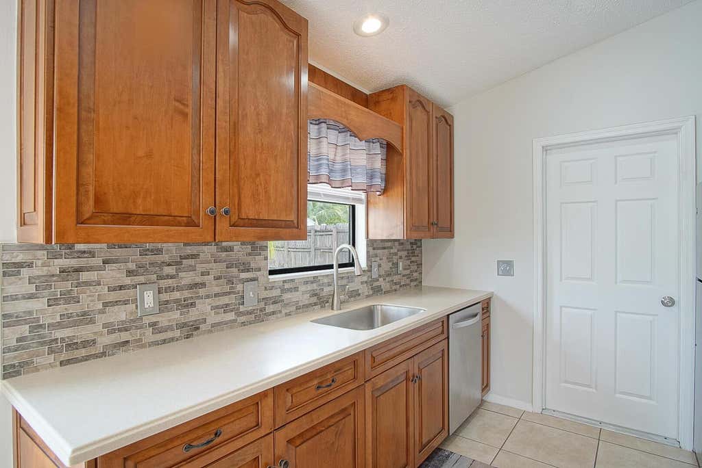 Photo of 3126 SW Curcuma Street, Port Saint Lucie, FL 34953 (MLS # R11104106)