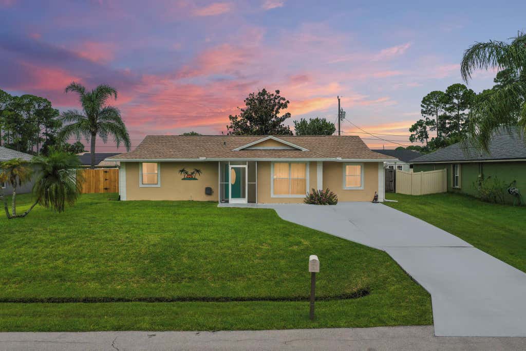 Photo of 3126 SW Curcuma Street, Port Saint Lucie, FL 34953 (MLS # R11104106)
