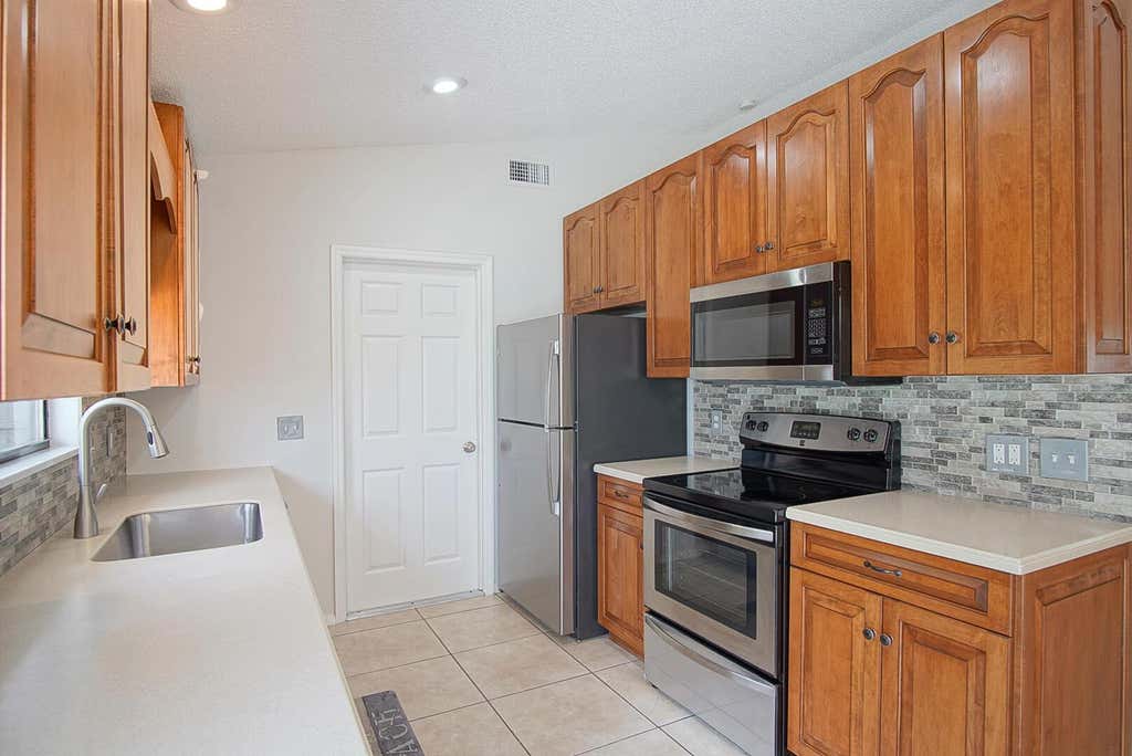 Photo of 3126 SW Curcuma Street, Port Saint Lucie, FL 34953 (MLS # R11104106)