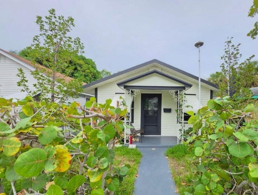 Spacious and versatile single-family home with 5 bedrooms and 4 full bathrooms, featuring a brand-new addition and luxury finishes. Smart layout includes Suite A (2/1) and Suite B (2/2) on the first level, which can also be seamlessly combined into a 4/3, plus an Art Studio (1/1 with private bath) on the second level, ideal as a creative studio, executive office, or guest suite. Multiple entry points provide privacy and independence for each area. Prime location just one block from vibrant Downtown Lake Worth and one mile from the beach, close to shopping, dining, arts, and entertainment. Quick access to Boynton Beach, West Palm Beach, and major highways. Landscaping maintenance and pest control included.