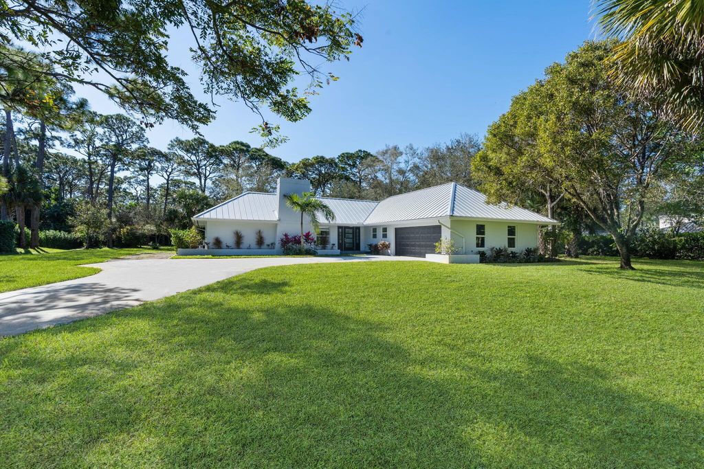 Photo of 5608 Old Fort Jupiter Road, Jupiter, FL 33458 (MLS # R10957309)