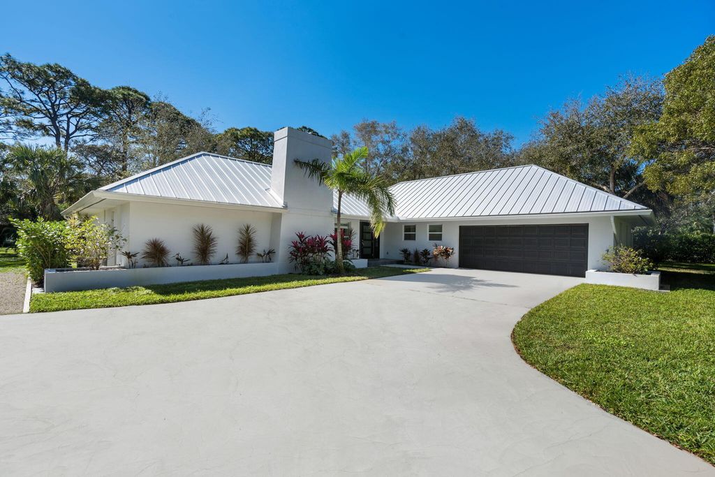 Photo of 5608 Old Fort Jupiter Road, Jupiter, FL 33458 (MLS # R10957309)