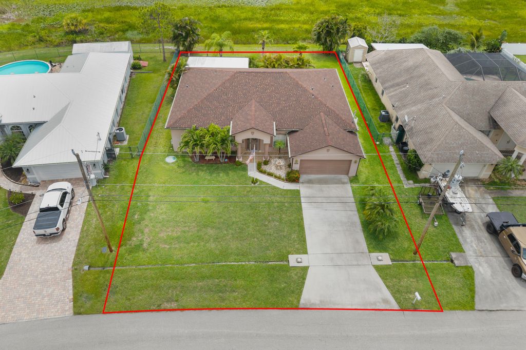 Photo of 6145 NW East Deville Circle, Port Saint Lucie, FL 34986 (MLS # R11097141)