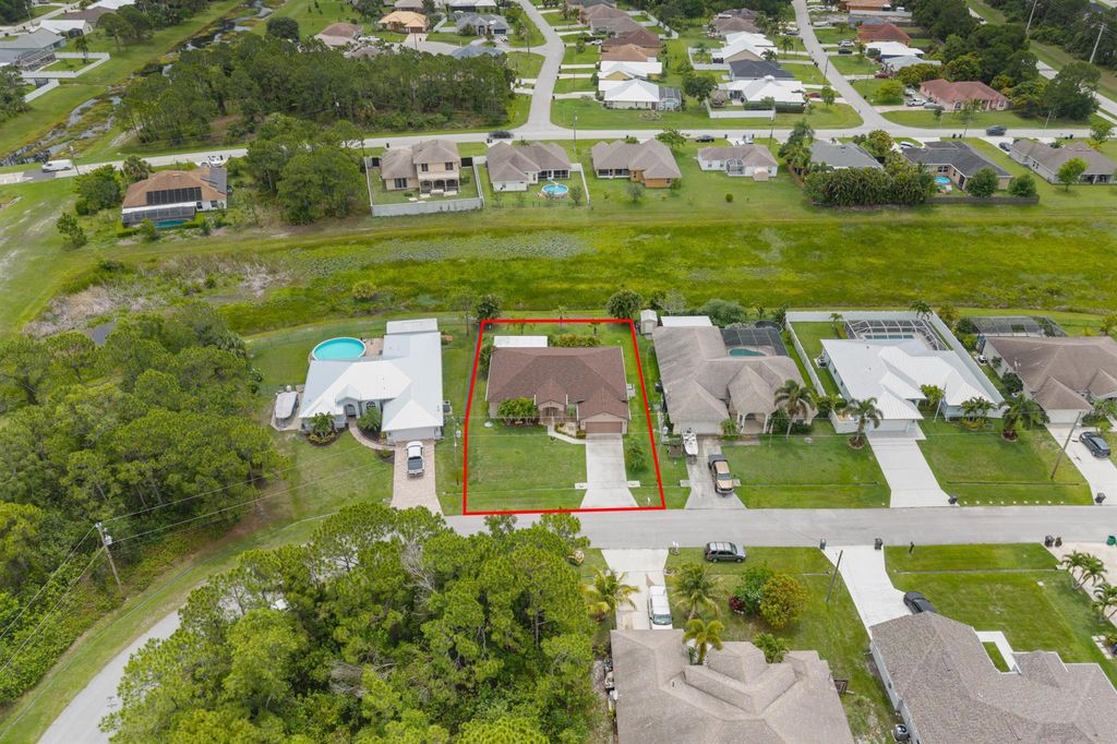 Photo of 6145 NW East Deville Circle, Port Saint Lucie, FL 34986 (MLS # R11097141)