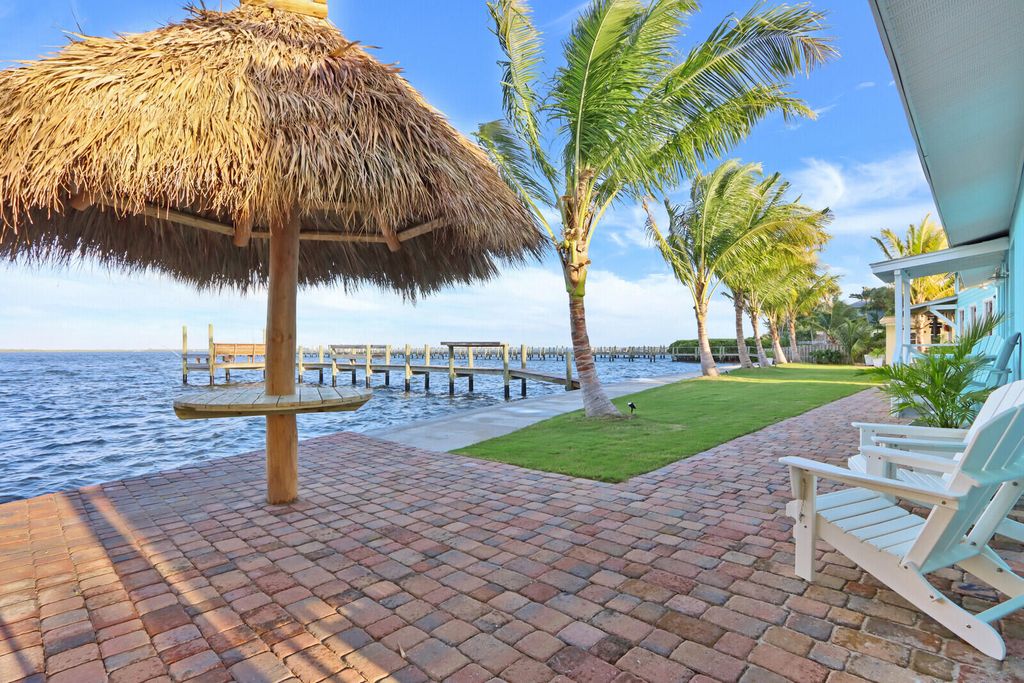 Photo of 2725 NE Indian River Drive, Jensen Beach, FL 34957 (MLS # R10955801)