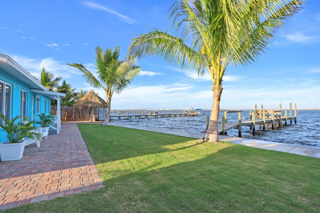 Photo of 2725 NE Indian River Drive, Jensen Beach, FL 34957 (MLS # R10955801)