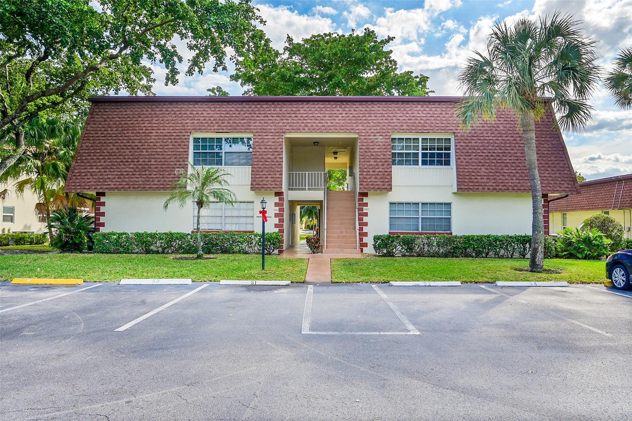 This beautifully updated condominium in the prestigious French Villas of Lighthouse Point offers 2 bedrooms, 1.5 bathrooms, and a very open floor plan, perfect for modern coastal living. Updates include engineered hardwood floors, elegant baseboards, new doors, lighting fixtures, and ceiling fans throughout. The bright kitchen features sleek white cabinetry, a stunning dolomite countertop, stainless steel appliances, and updated faucets, while the bathrooms boast modern vanities and stylish tile flooring. Fresh paint, custom shades, updated outlets, and a tankless water heater make it move-in ready. Impact Windows. Residents enjoy amenities like beautiful pool, billiard room, and game room. Close to parks, the beach, and Lighthouse Point’s best offerings, this property is a rare find.