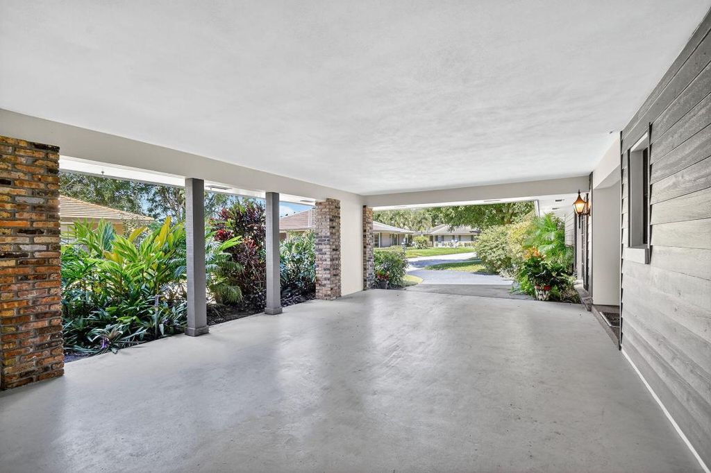 Photo of 612 Cypress Key Drive, Atlantis, FL 33462 (MLS # R11133535)