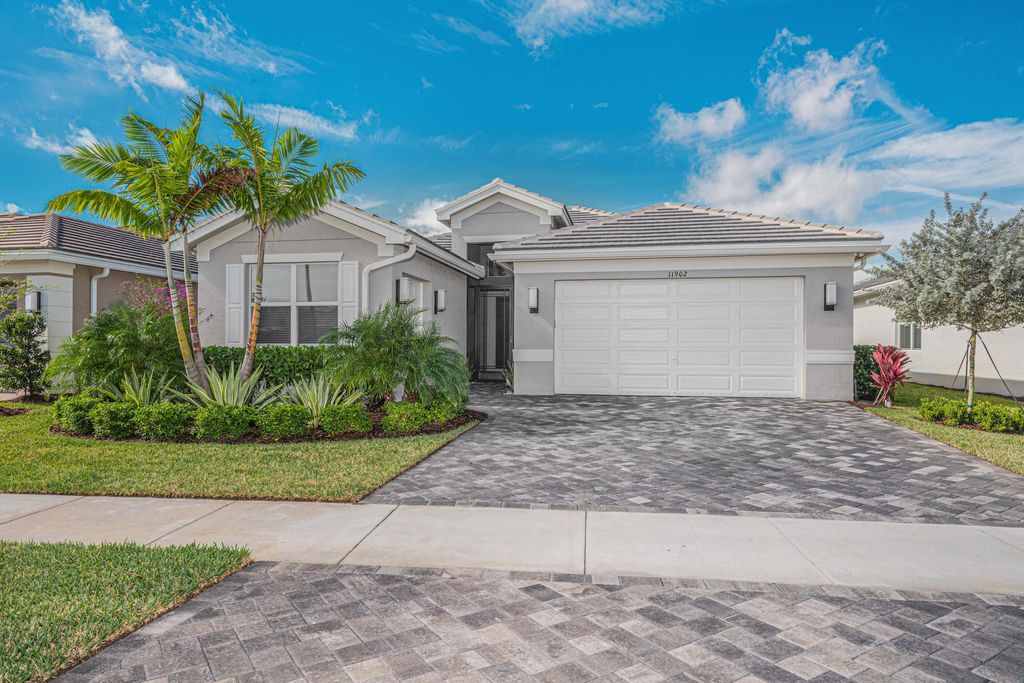 Photo of 11902 SW Poseidon Way, Port Saint Lucie, FL 34987 (MLS # R10952357)