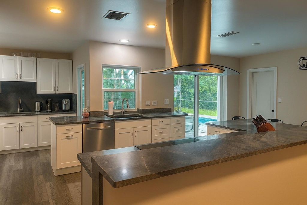 Photo of 1650 NW 9th St, Boca Raton, FL 33486 (MLS # F10533257)