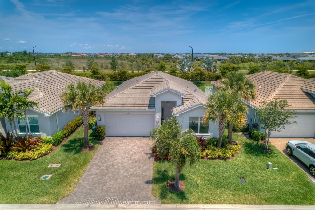 Photo of 12031 SW Jasper Lake Way, Port St Lucie, FL 34987 (MLS # R10888934)