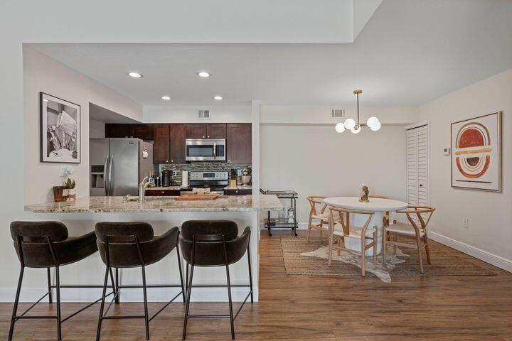 Beautiful remodel condo. As you step inside, you'll find a bright, high ceiling and open living space with tile flooring throughout, adding a touch of elegance and ease of maintenance. The condo features a large balcony, perfect for morning coffee or relaxation. Close to restaurants, airport,downtown,Beach,I-95 and more..