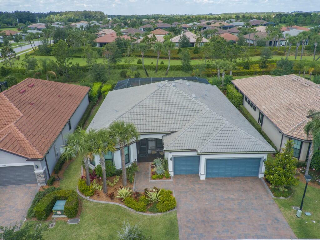 Private Preserve Lot | Custom Upgrades Throughout | Move-In Ready! Discover one of the most beautifully upgraded Pinnacle models in the community--situated on a preserve lot for Maximum privacy and tranquility. This 3-bedroom + den, 3-bath, 3-car garage home offers 2,500 sq ft of designed living space with 9'4''+ ceilings, 8' interior doors, and stunning tile throughout. Exceptional features include:Whole-house generator, impact glass, and electronic hurricane screens for full storm protectionHeated, salt water, screened-in pool and spa with a fully equipped outdoor kitchenSpacious fenced backyard with lush landscaping and a serene preserve beyondChef's kitchen with open-concept layout, perfect for entertaining*