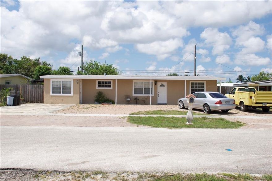 Fully remodeled home. Granite kitchen counter tops tile throughout. Home features a 1/1 efficiency with a separate entrance. Huge back yard with private in ground pool. Crown molding throughout home. Great home for first time home buyer or rental income property for investor