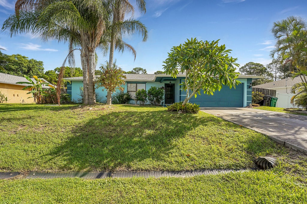 Photo of 1809 SW Oakwood Road, Port Saint Lucie, FL 34953 (MLS # R11007294)