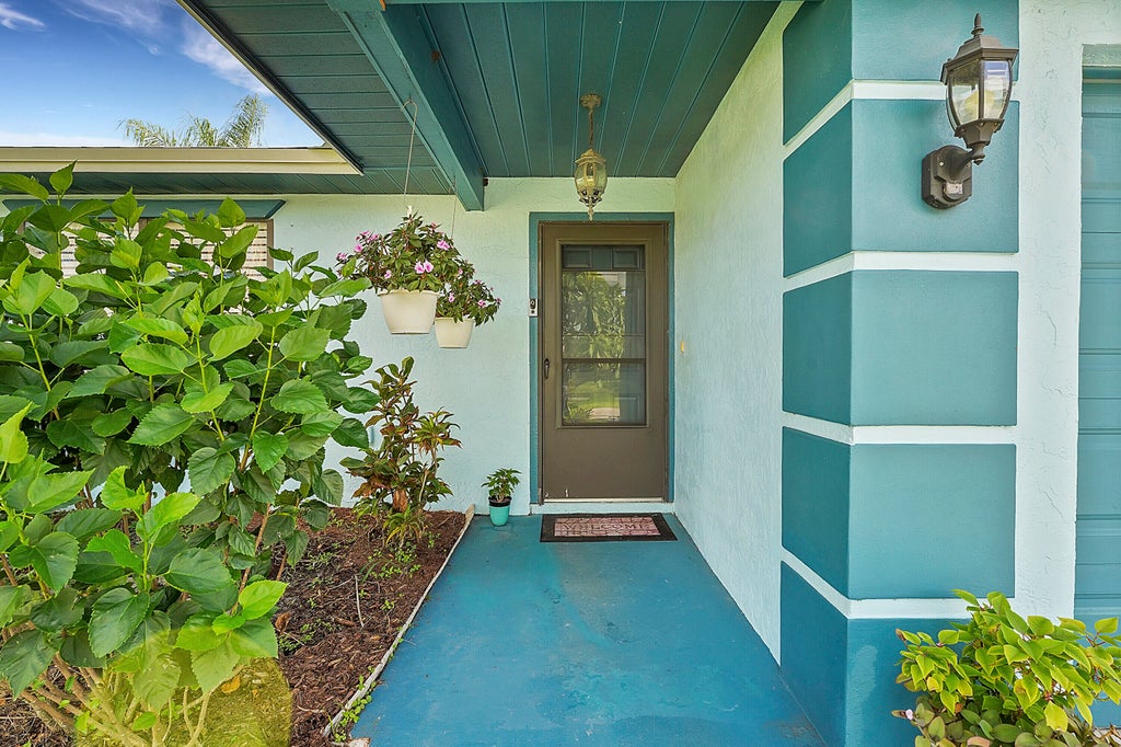 Photo of 1809 SW Oakwood Road, Port Saint Lucie, FL 34953 (MLS # R11007294)