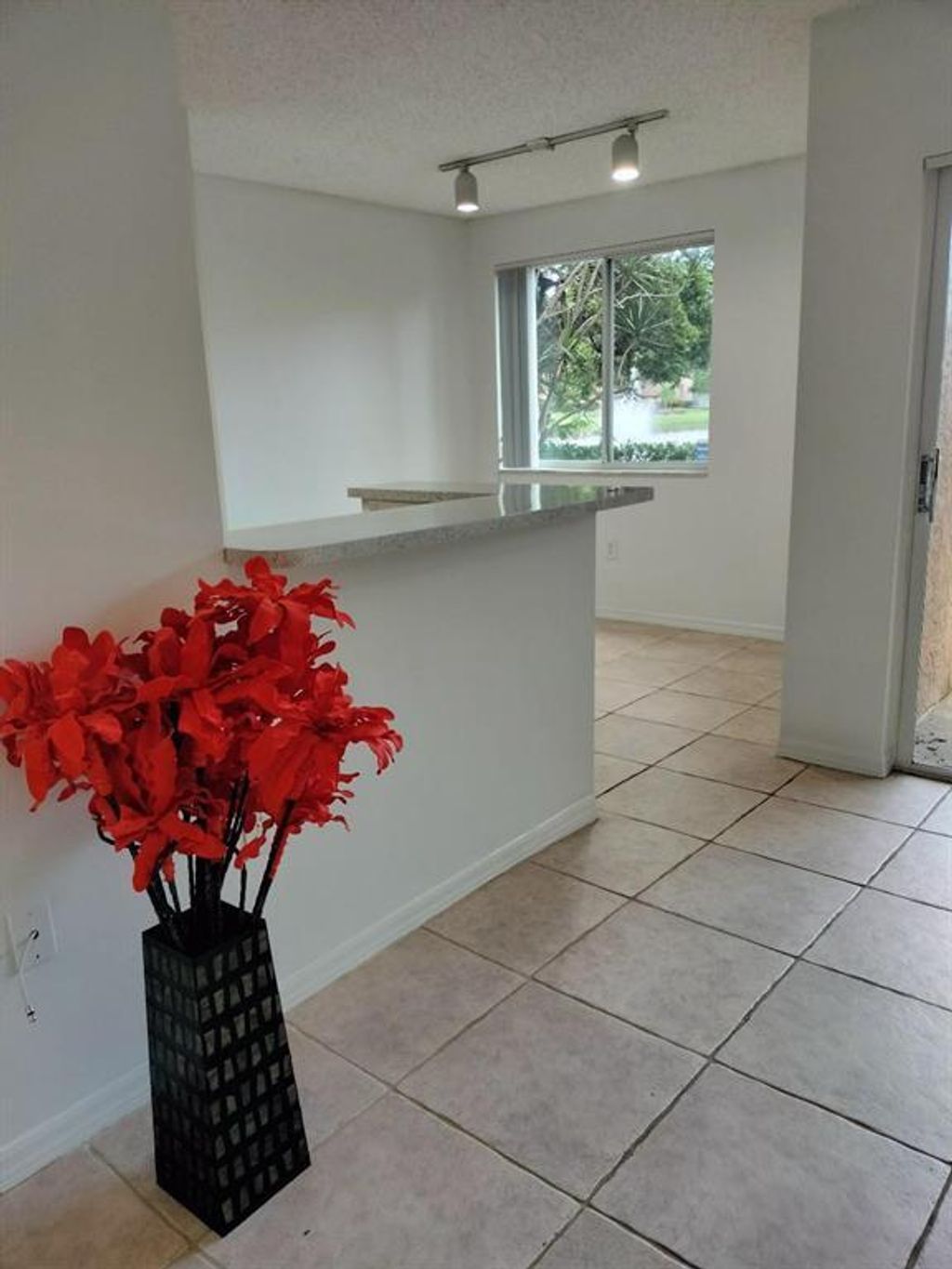 Photo of 3830 Lyons Road #110-3, Coconut Creek, FL 33073 (MLS # B26025876)