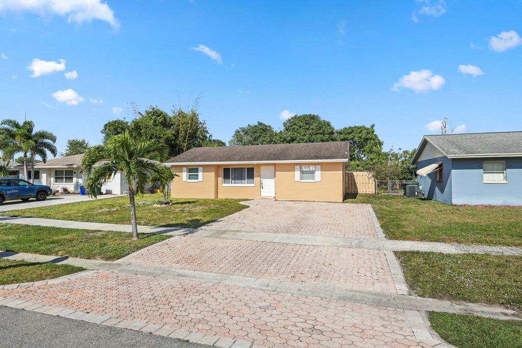 Photo of 5613 S 36th Street, Greenacres, FL 33463 (MLS # R11143920)