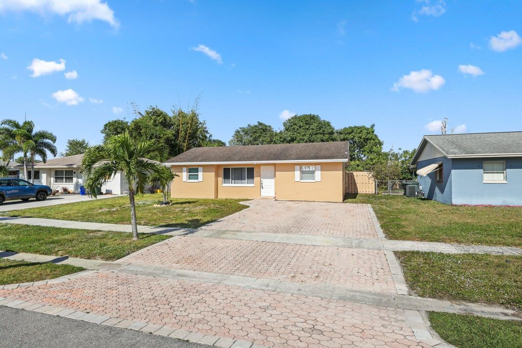 Photo of 5613 S 36th Street, Greenacres, FL 33463 (MLS # R11143920)