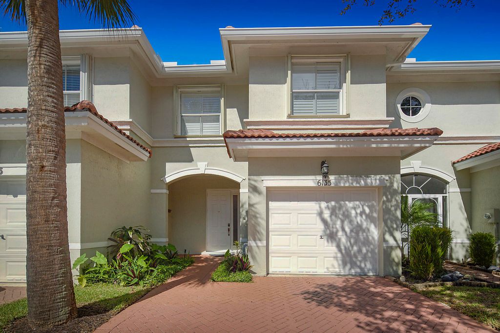 Photo of 6135 Seminole Gardens Circle E, Riviera Beach, FL 33418 (MLS # R11120901)