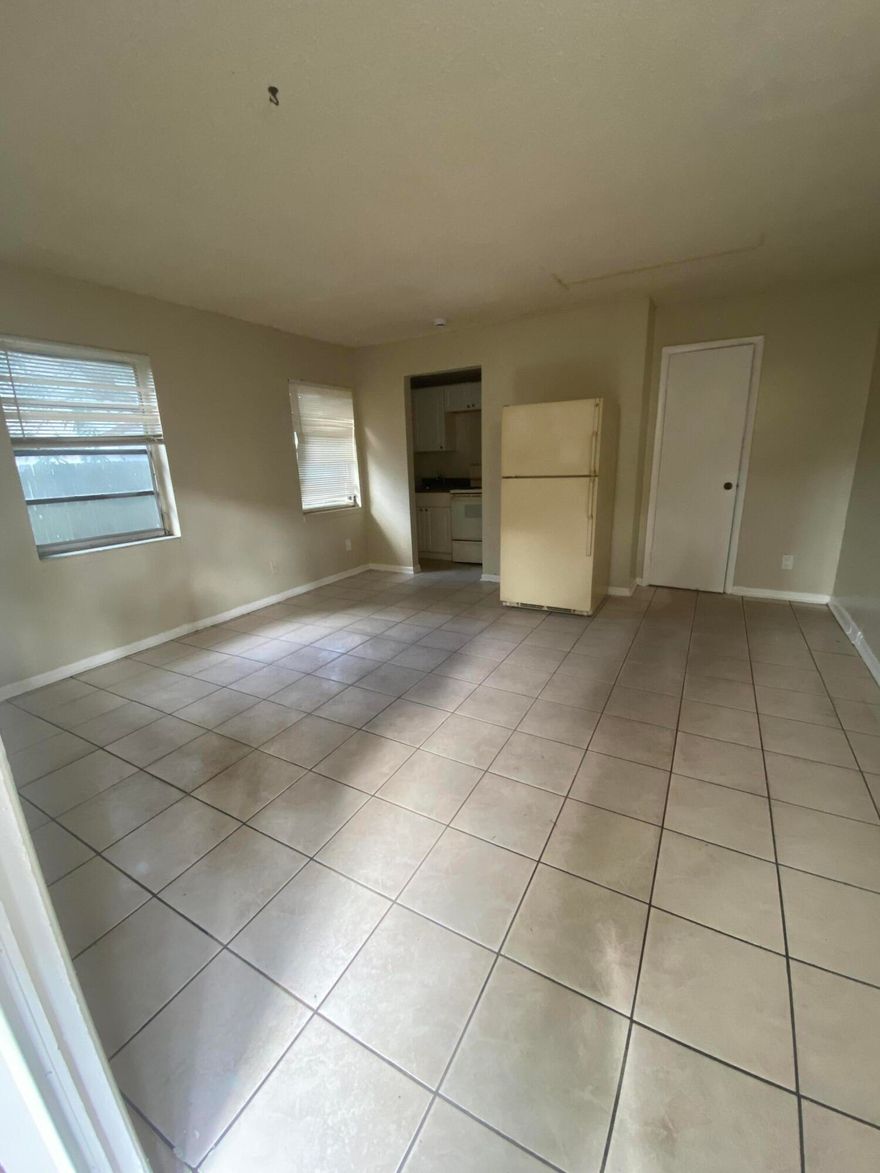 4-unit income property in the heart of Middle River Terrace Two 1-bed/1-bath units and two studios units. Building is 2,106 square feet on a 6,760 sq ft RM-15 zoned lot. Must be purchased as a package with the adjacent property(1409 NE 5th Ter), creating a combined assemblage that unlocks development potential with both properties.
