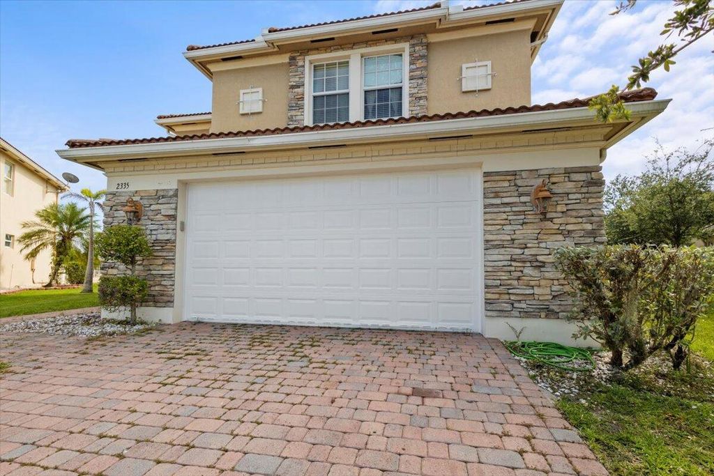 Photo of 2335 NW Via Della Ct, Port Saint Lucie, FL 34986 (MLS # R11022884)