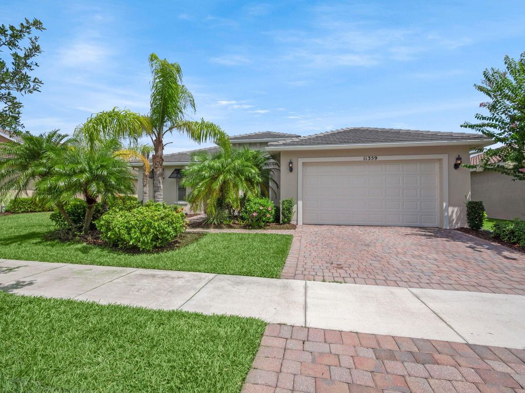 Photo of 11359 SW Apple Blossom Trail, Port Saint Lucie, FL 34987 (MLS # R11106485)