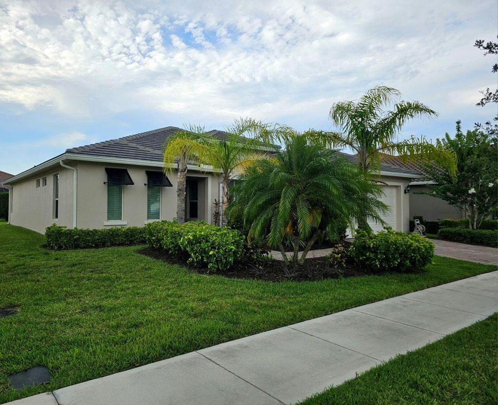 Photo of 11359 SW Apple Blossom Trail, Port Saint Lucie, FL 34987 (MLS # R11106485)