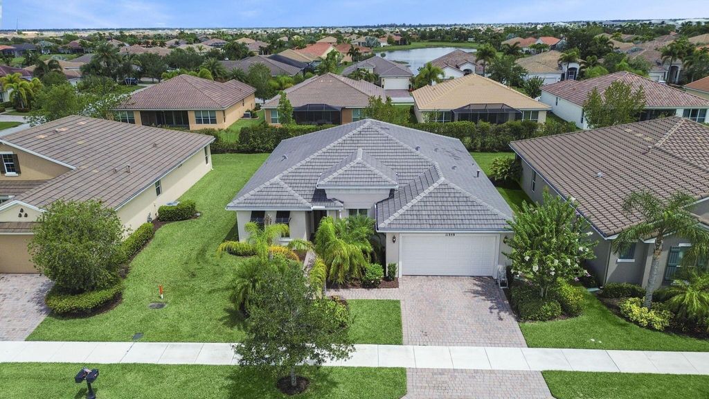 Photo of 11359 SW Apple Blossom Trail, Port Saint Lucie, FL 34987 (MLS # R11106485)