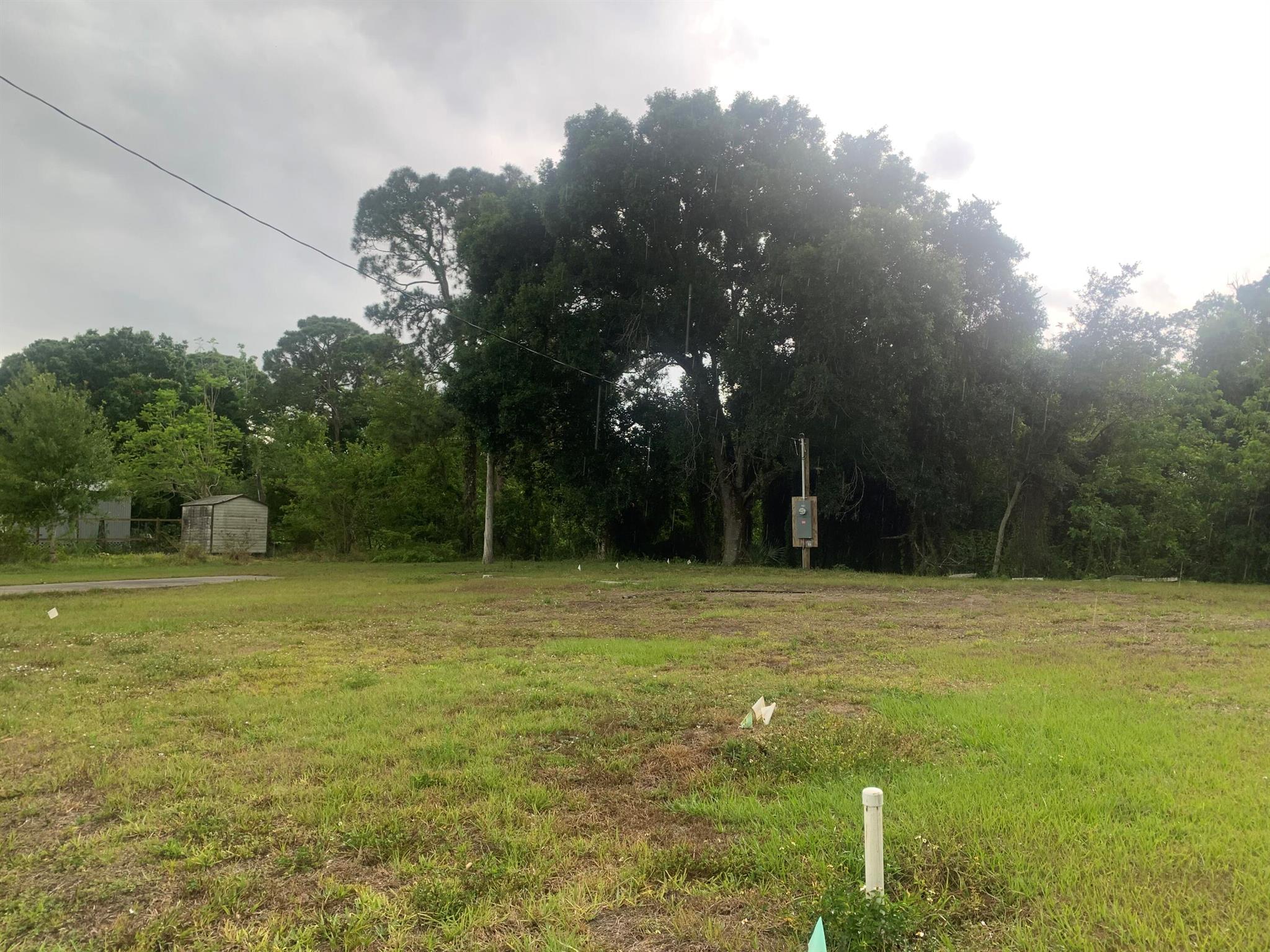 Vacant and cleared corner lot for sale in Lar-kee Lakes Subdivision for mobile homes. This property features a septic system, and is equipped with it's own well. Essential utilities such as electricity are already in place.