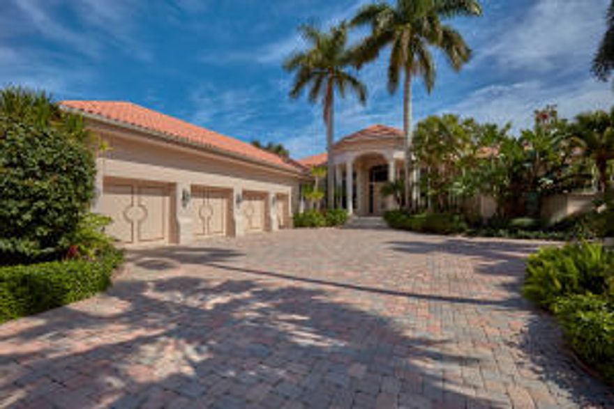 Come live the FL lifestyle in this beautiful custom waterfront estate on .66 acre corner lot. Sunny southeast facing home is light and bright with oversized windows, saturnia floors, and complete hurricane protection. Island kitchen with two ovens, 4 burner gas stove, double dishwashers and sinks, double microwaves. Spacious master retreat with his and her baths, (hers with steam shower and regular shower), sitting room/exercise area, 2 large walk in closets. Resort style pool and spa with multiple seating areas perfect for entertaining, summer kitchen. Dock accommodates a 70' yacht with a sundeck to admire your beautiful water view.Superior construction by Shapiro Portnoy with many upgrades including 5/8 sheetrock and pest control tubes within walls.