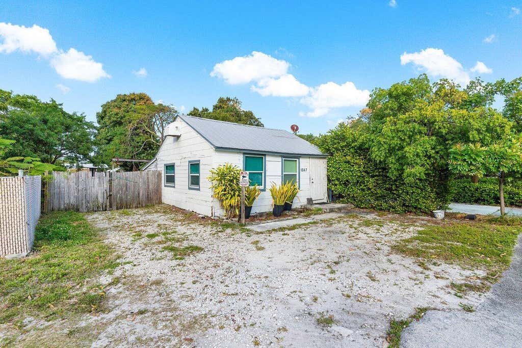 Photo of 1047 Miner Road, Lake Worth, FL 33462 (MLS # B26054044)