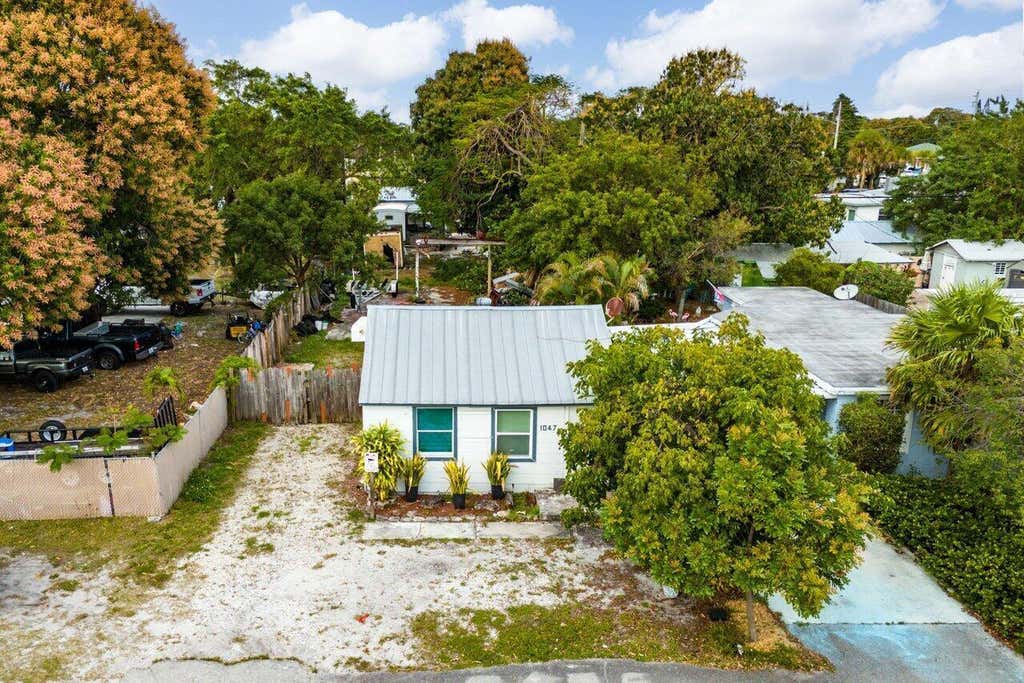 Photo of 1047 Miner Road, Lake Worth, FL 33462 (MLS # B26054044)