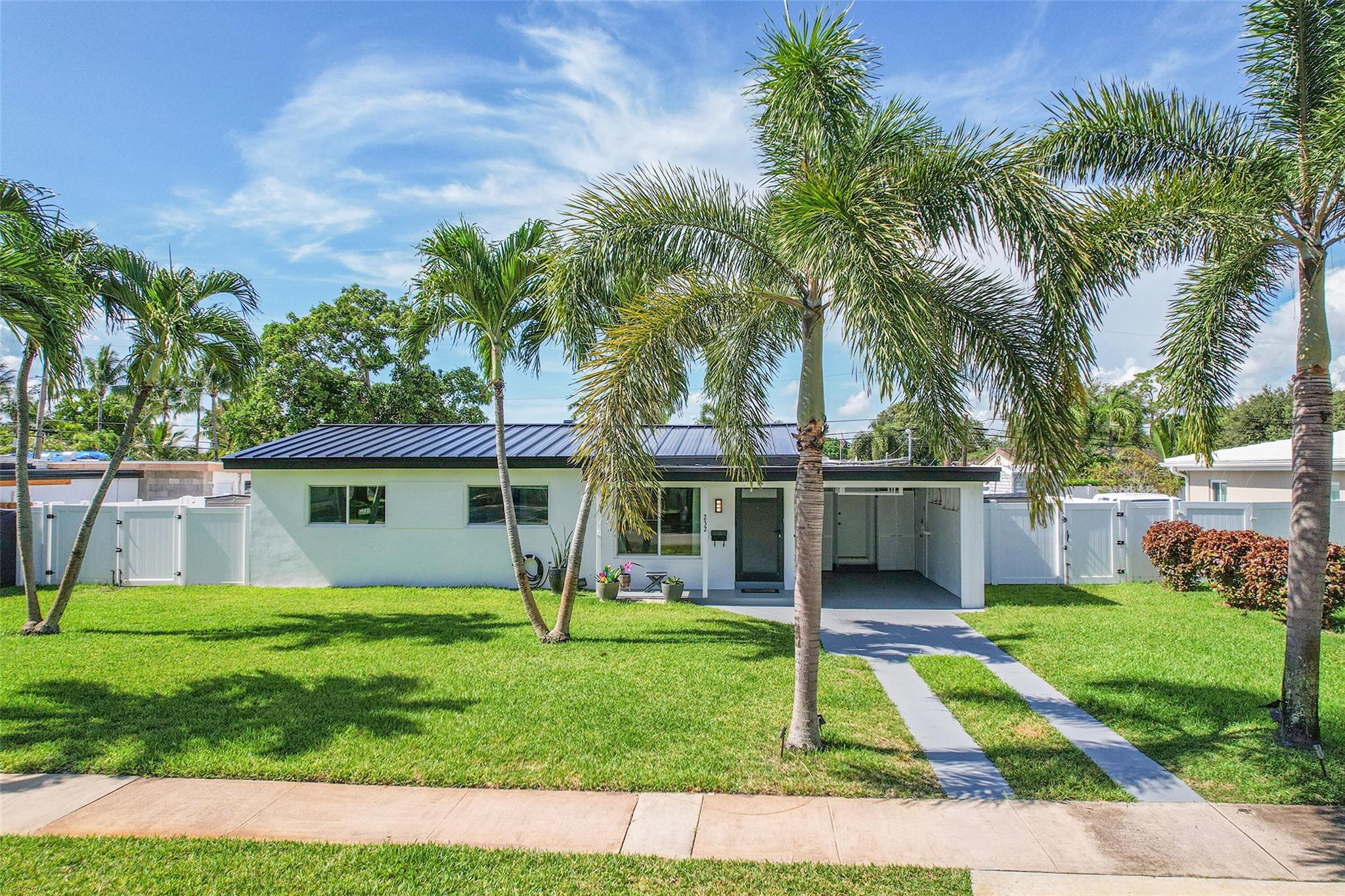 Fully updated 4BR/2BA pool home in prime Pompano Beach! Features a new 2025 metal roof, new flat roof, PVC plumbing, new A/C ductwork, gas hot water heater, and impact windows/doors throughout. Enjoy a spacious open layout. The modern kitchen offers an island, stainless steel appliances, gas stove, and recessed lighting. Primary suite includes a large walk-in closet. Step outside to a fully fenced backyard with a heated pool, with a gas pool heater and tropical landscaping. Stylish finishes and move-in ready—perfect for South Florida living!