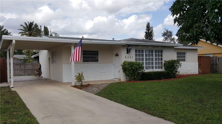 BEAUTIFUL UPDATED 3 BEDROOM 2 BATH HOME. DREAM KITCHEN WITH WOOD CABINETS, GRANITE COUNTER TOPS AND STAINLESS STEEL APPLIANCES. TILE FLOORS IN LIVING AREAS AND BEAUTIFUL WOOD LAMINATE FLOORS IN ALL 3 BEDROOMS, CROWN MOLDING, UPDATED BATHS, LARGE COVERED AND TILED PATIO, NEWER CENTRAL AC, COMPLETELY FENCED YARD (FRONT AND BACK)HUGE UTILITY ROOM. THIS ONE WILL NOT LAST!